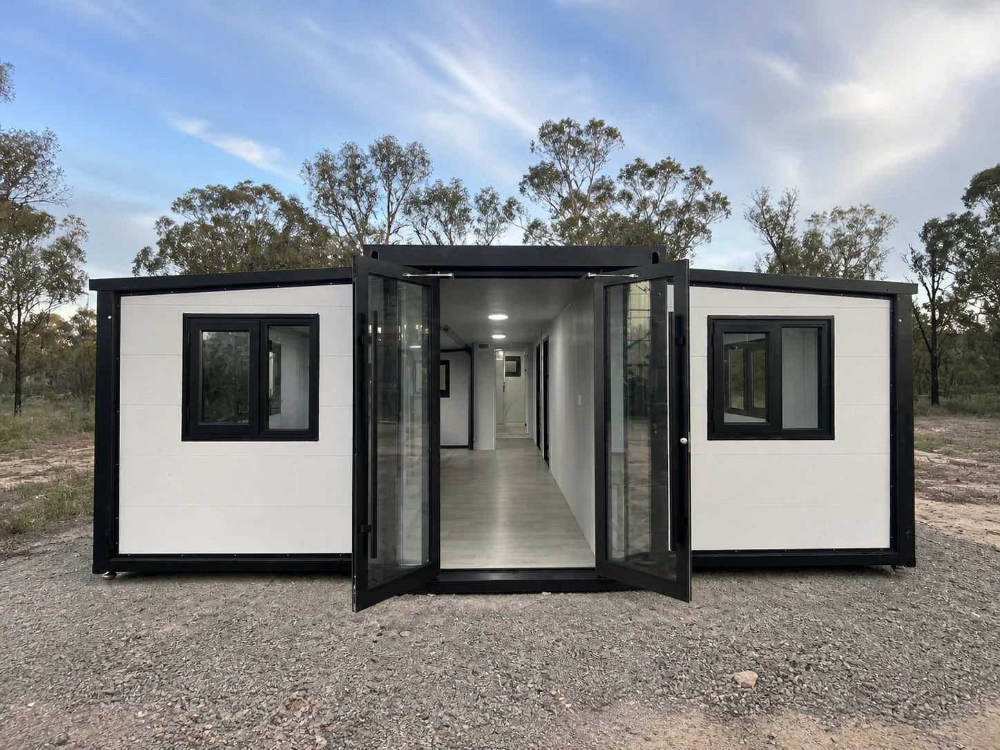 Black-trim modular home entry elevation