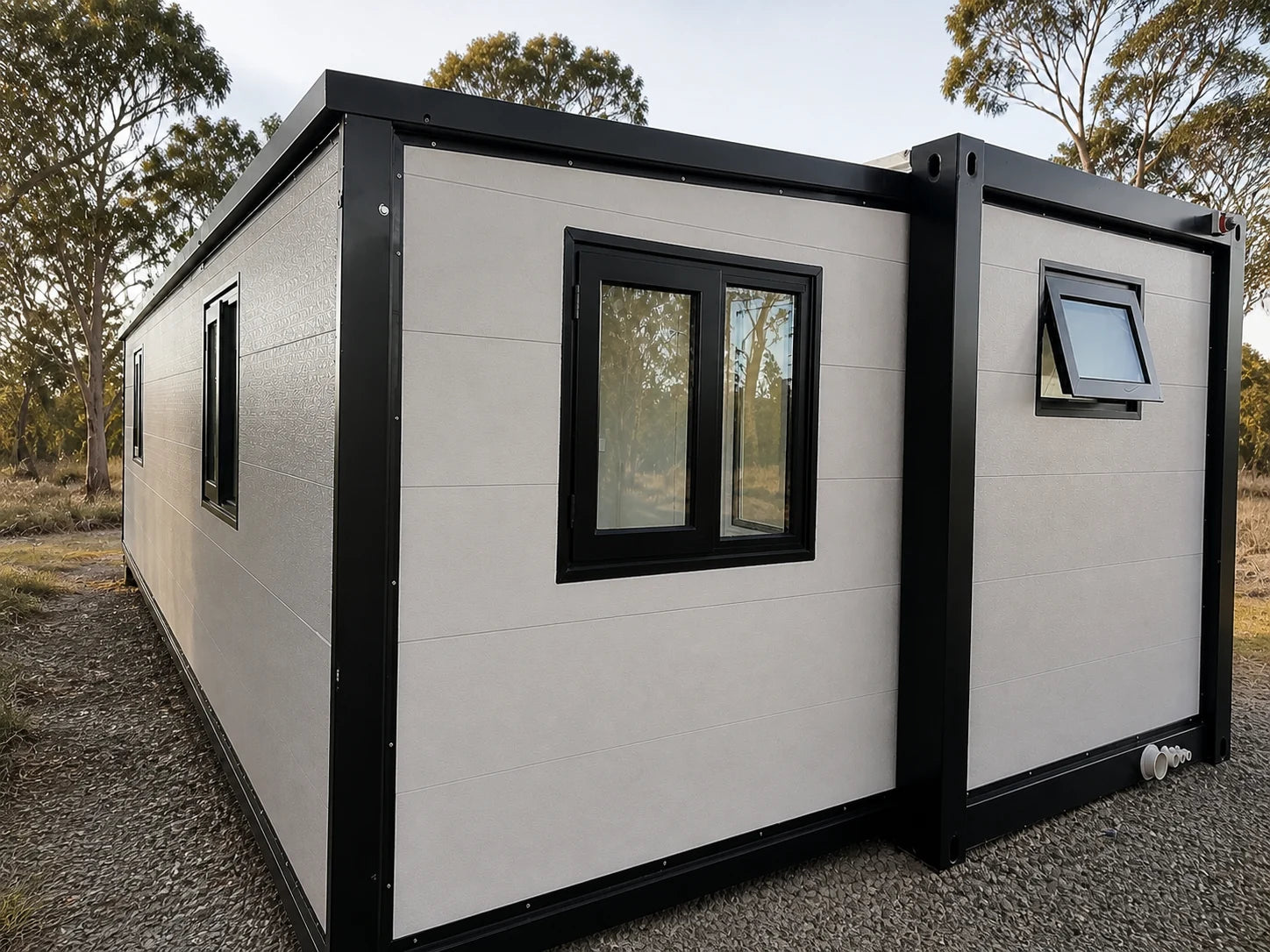 Black-trim modular home corner exterior