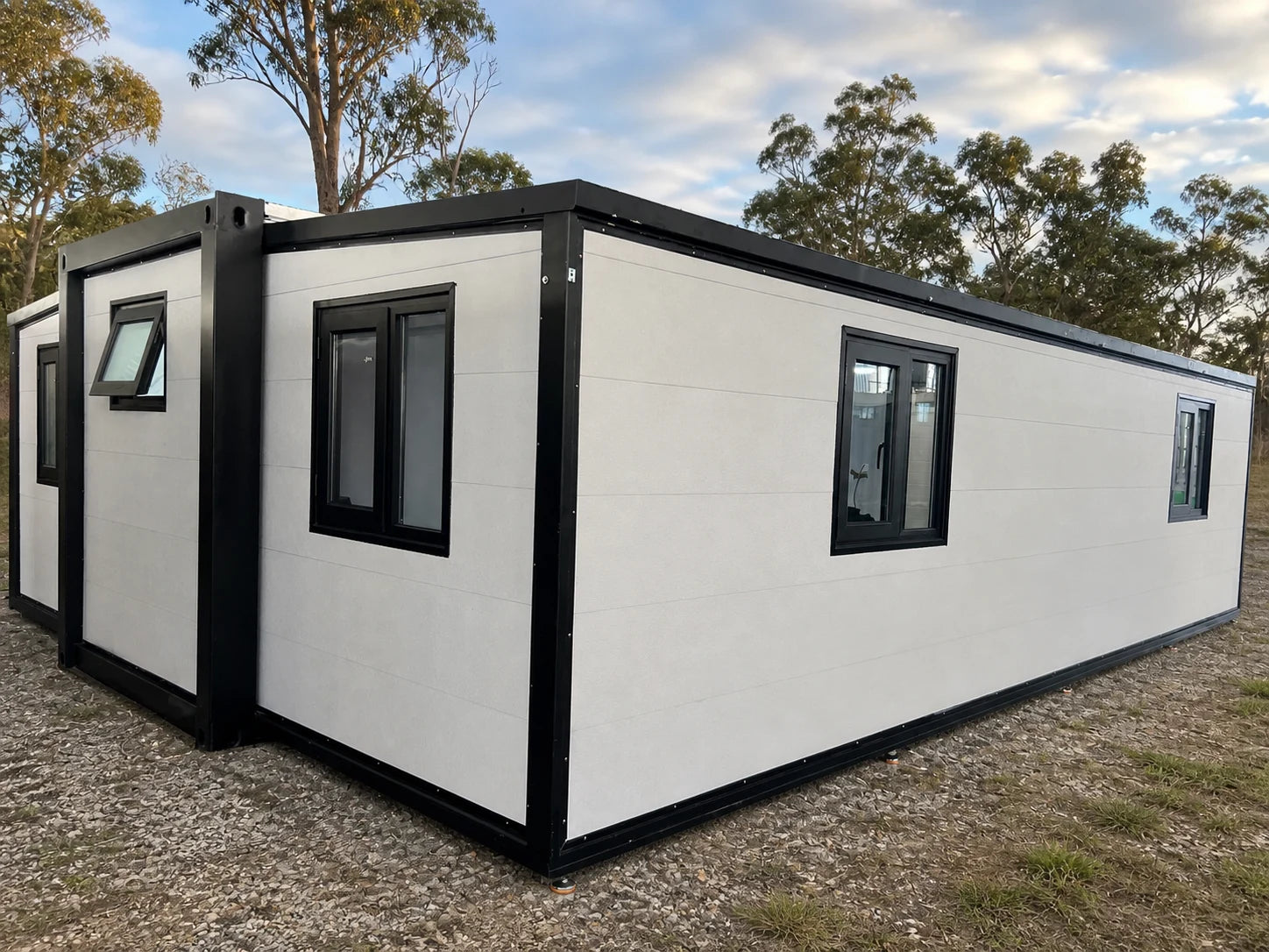 Black-trim modular home rear exterior