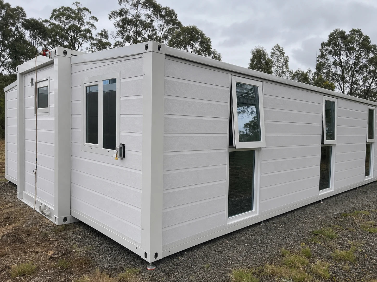 White modular home rear corner exterior