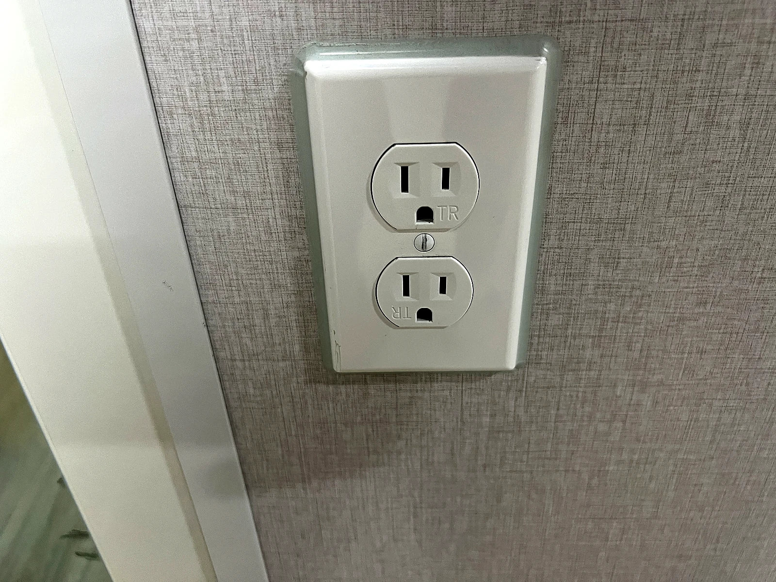 Interior wall power outlet