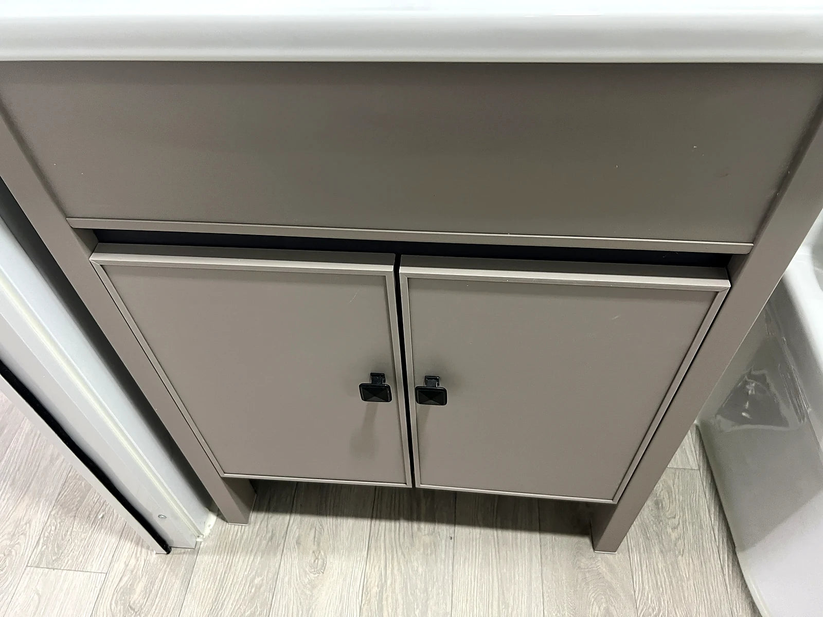 Closed bathroom vanity cabinet